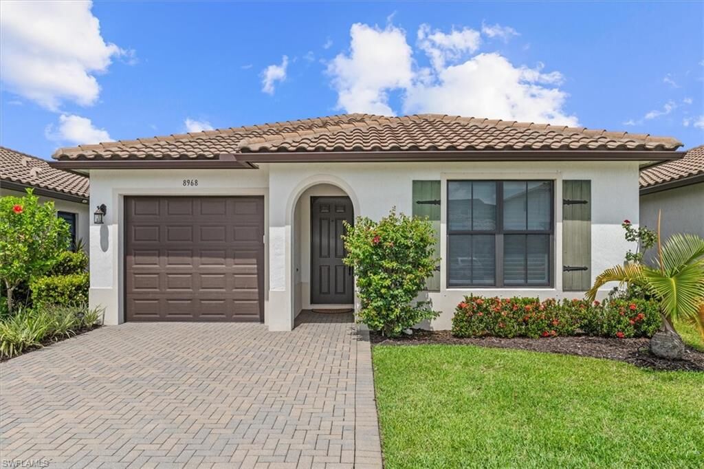 Property Photo: 8968 Madrid Cir FL 34104