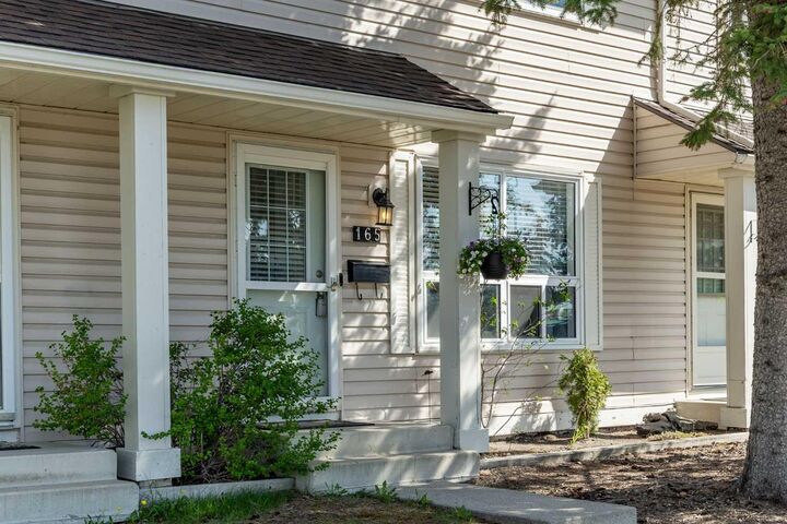Property Photo:  165 Woodmont Terrace SW  AB T2W 4Z4 