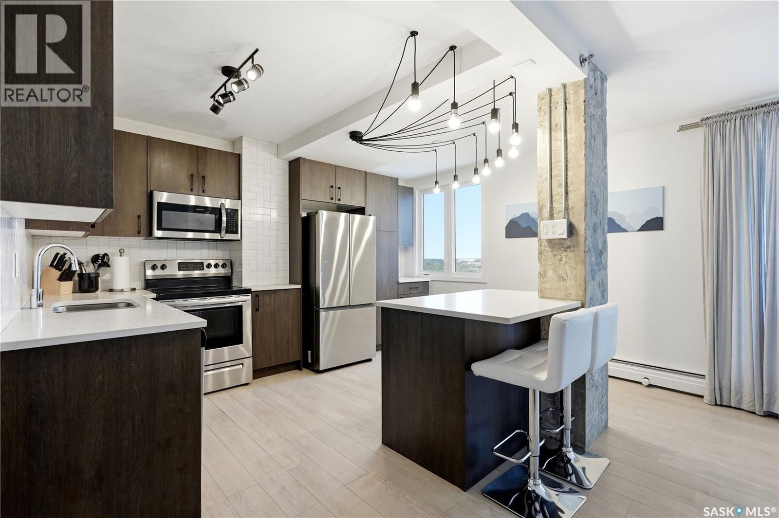 Property Photo:  1604 320 5th Avenue  SK S7K 2P5 