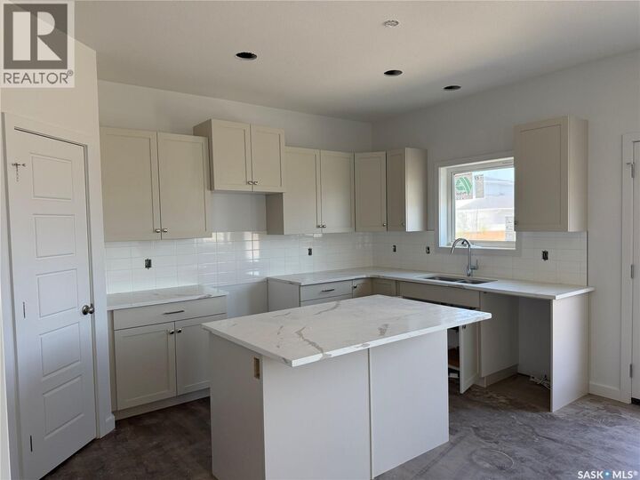 Property Photo:  327 Cowessess Road  SK S7V 1Y4 