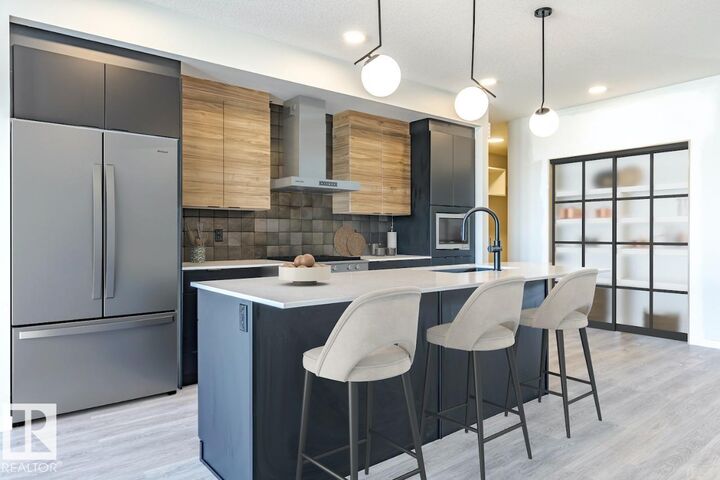 Property Photo: 7387 Klapstein Crescent SW AB T6W 0A6