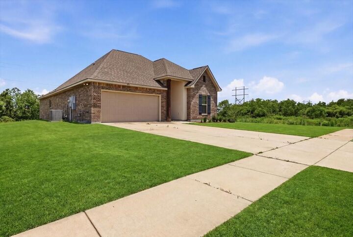 Property Photo:  702 Balsa Wood Drive  TX 77630 