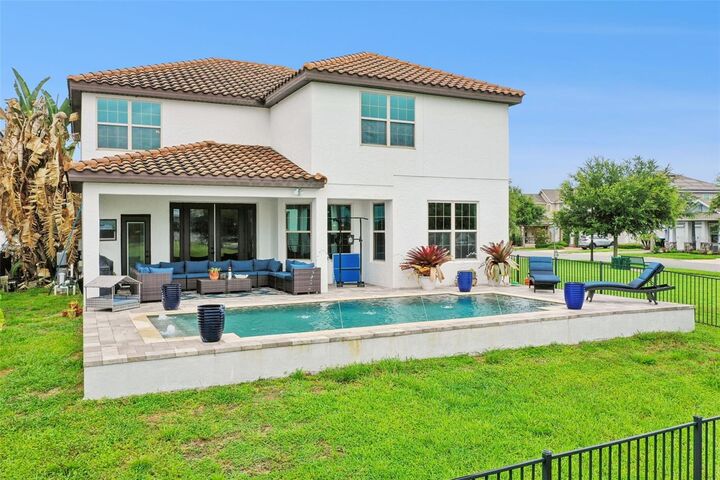 Property Photo: 9189 Busaco Park Way FL 34787