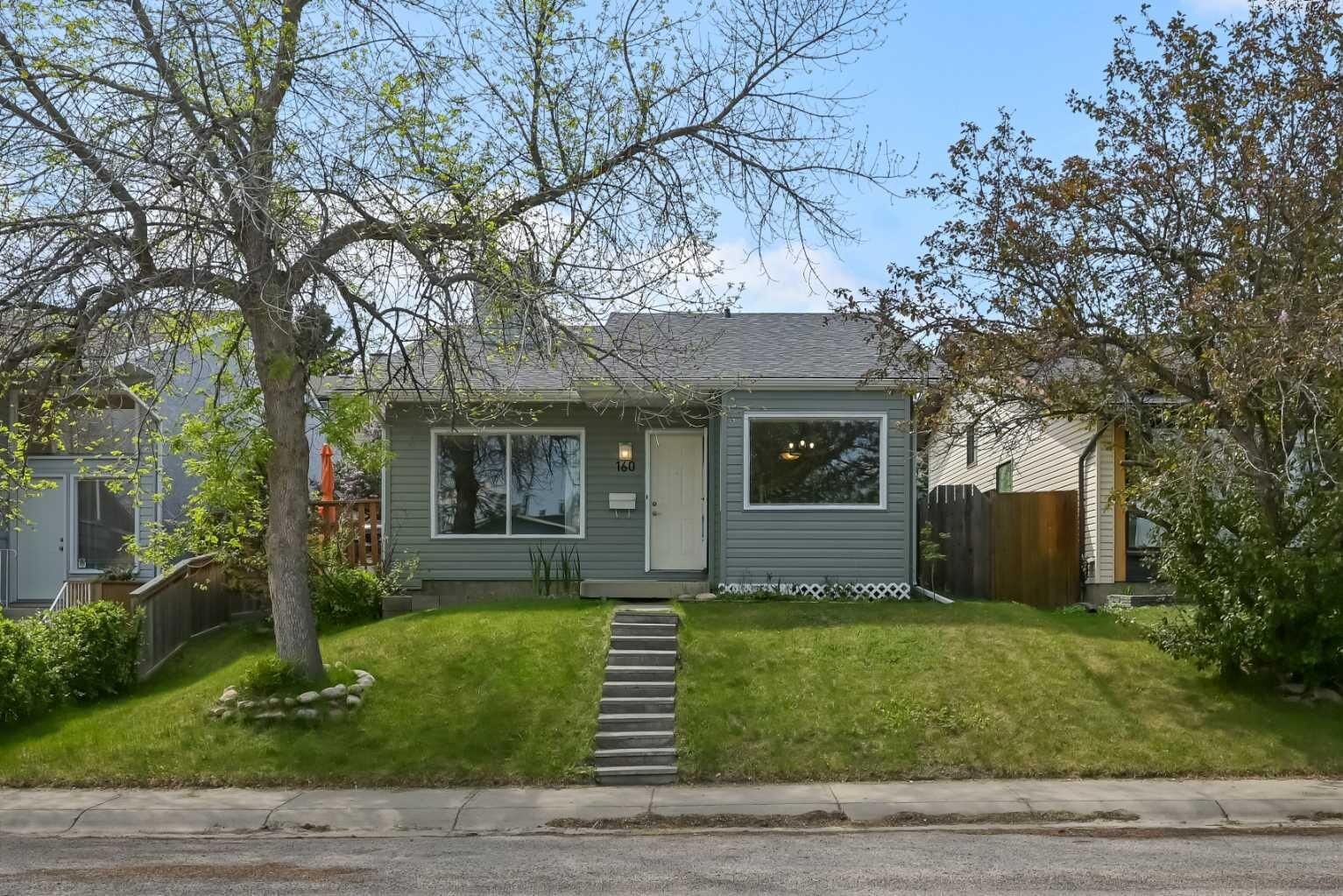 Property Photo: 160 Strathcona Close SW AB T3H 1L3
