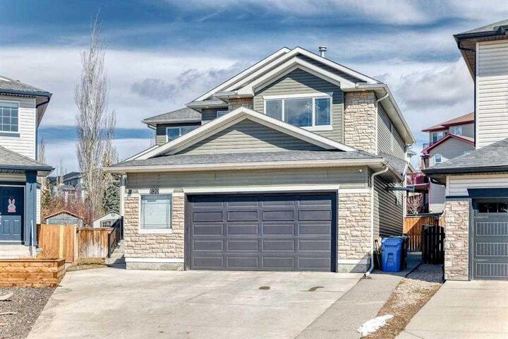 Property Photo: 630 Rocky Ridge View NW AB T3G 5C2