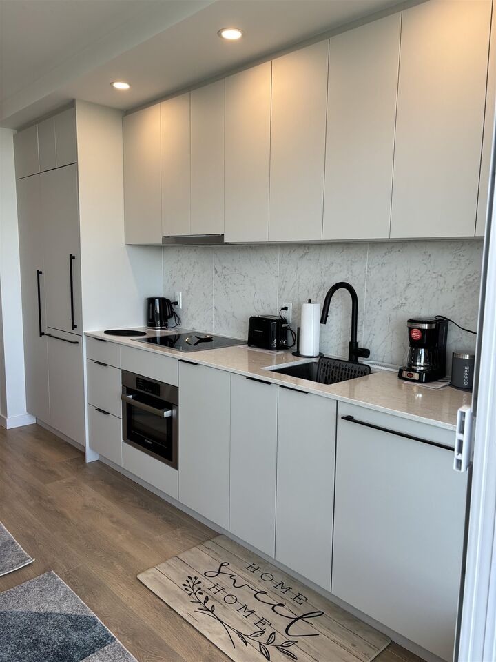 Property Photo: 13685 102 Avenue 2403 BC V3T 1N7