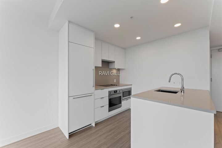 Property Photo: 13675 107A Avenue 2609 BC V3T 0X3
