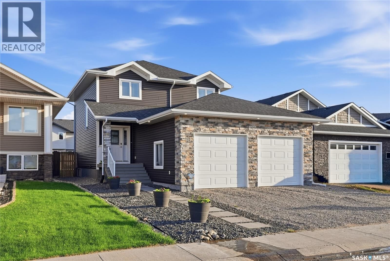 Property Photo:  323 Cowan Crescent  SK S0K 2T1 
