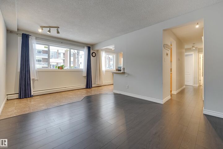 Property Photo:  10621 79 Avenue NW 105  AB T6E 1S2 