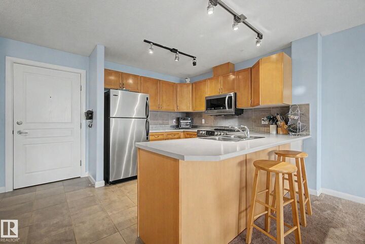 Property Photo: 530 Hooke Road NW 303 AB T5A 5J5