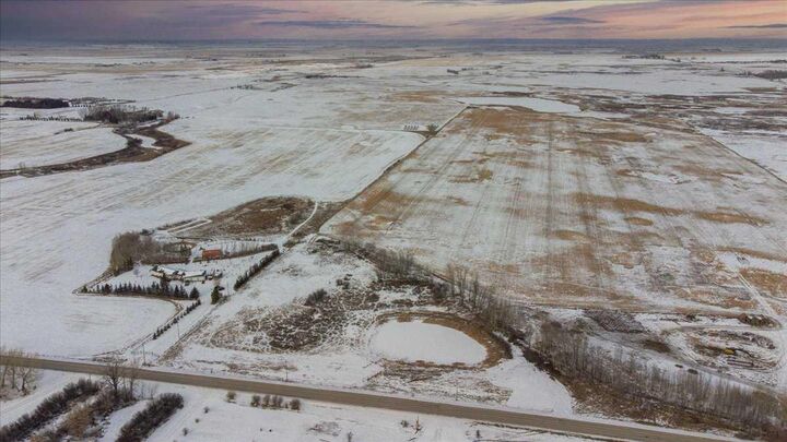 Property Photo:  253032 Township Road 244  AB T1P 1H5 