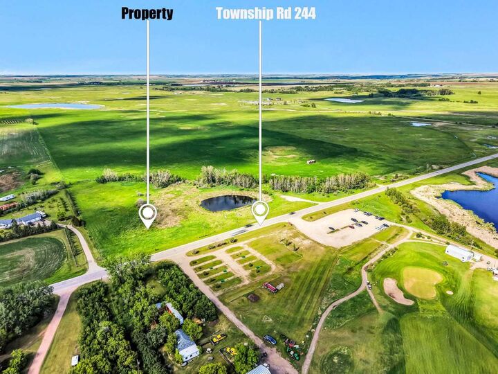 Property Photo:  253032 Township Road 244  AB T1P 1H5 
