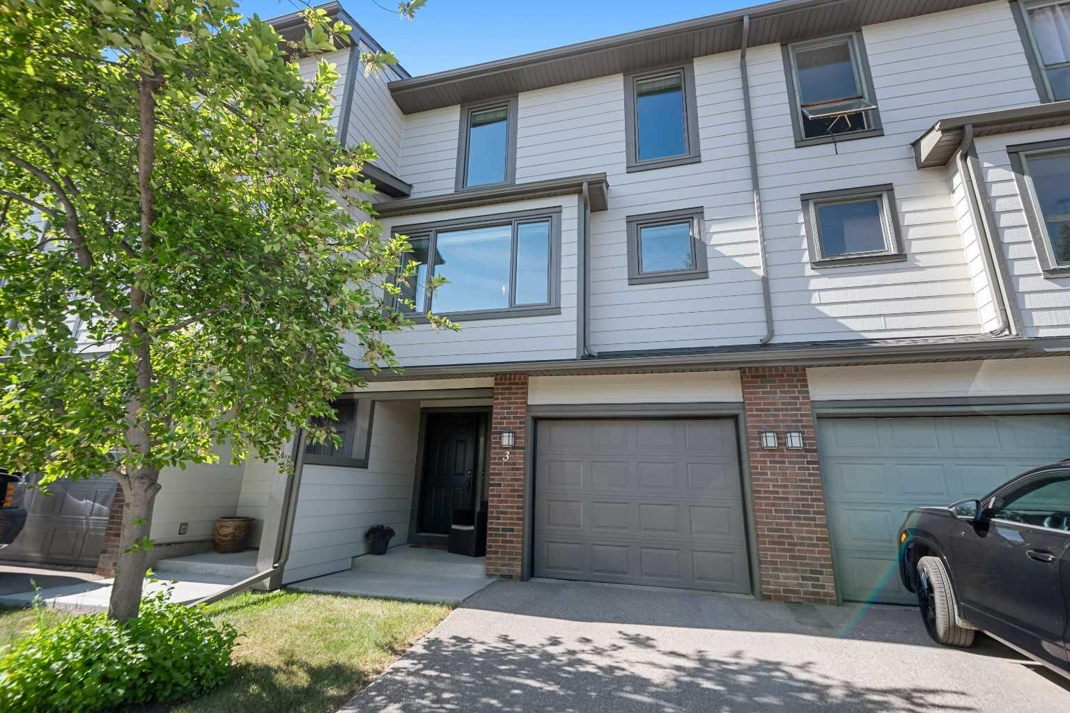 Property Photo:  185 Woodridge Drive SW 3  AB T2W 3X7 