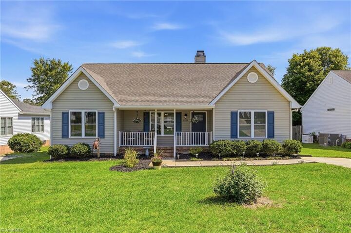 Property Photo:  7109 Taunton Drive  NC 27410 