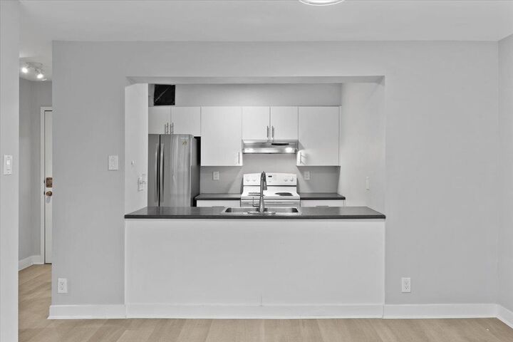 Property Photo: 9521 Cardston Court 403 BC V3N 4R8