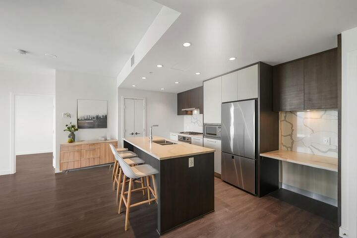 Property Photo: 567 Clarke Road 3904 BC V3J 0K7