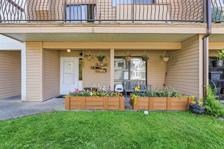 Property Photo: 7139 133A Street 103 BC V3W 8A1