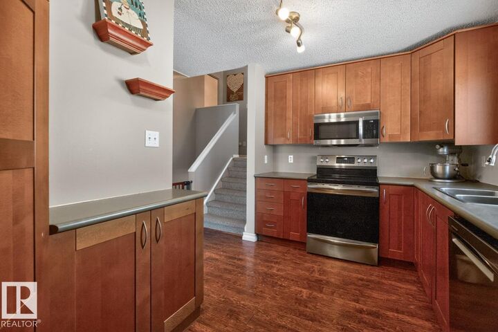 Property Photo:  18655 61 Avenue NW  AB T6M 2B3 
