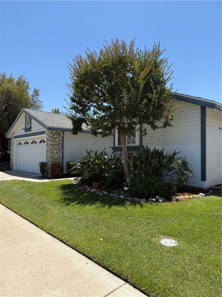 Property Photo:  140 W Pioneer 170  CA 92374 