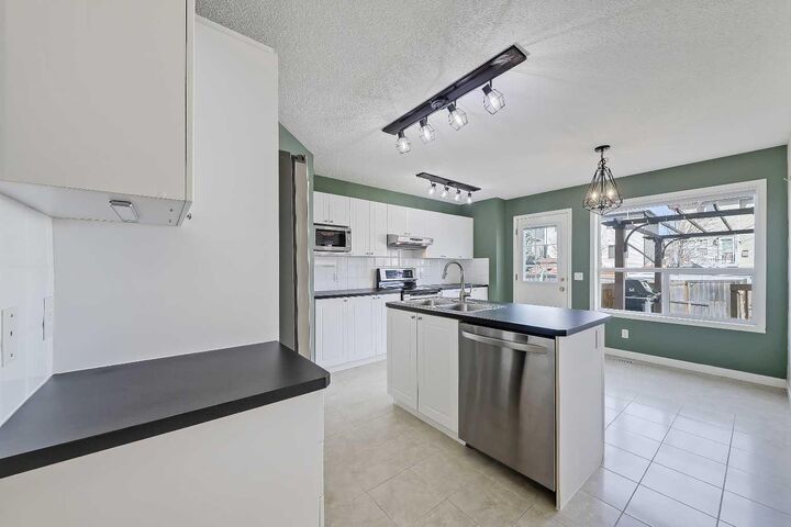 Property Photo: 123 Arbour Butte Road NW AB T3G 4L9