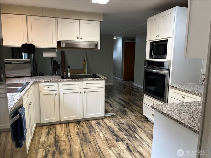 Property Photo:  3333  228th St SE 113  WA 98021 