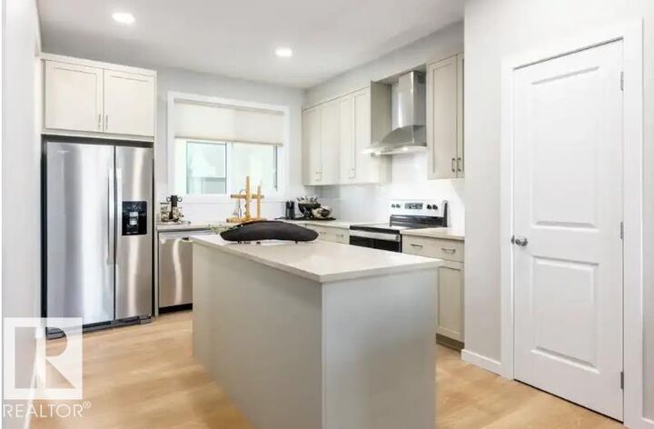 Property Photo:  5607 Parc Reunis Way  AB T4X 2Z7 