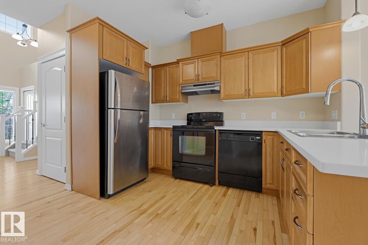 Property Photo:  11612 11 Avenue SW  AB T6W 1W8 