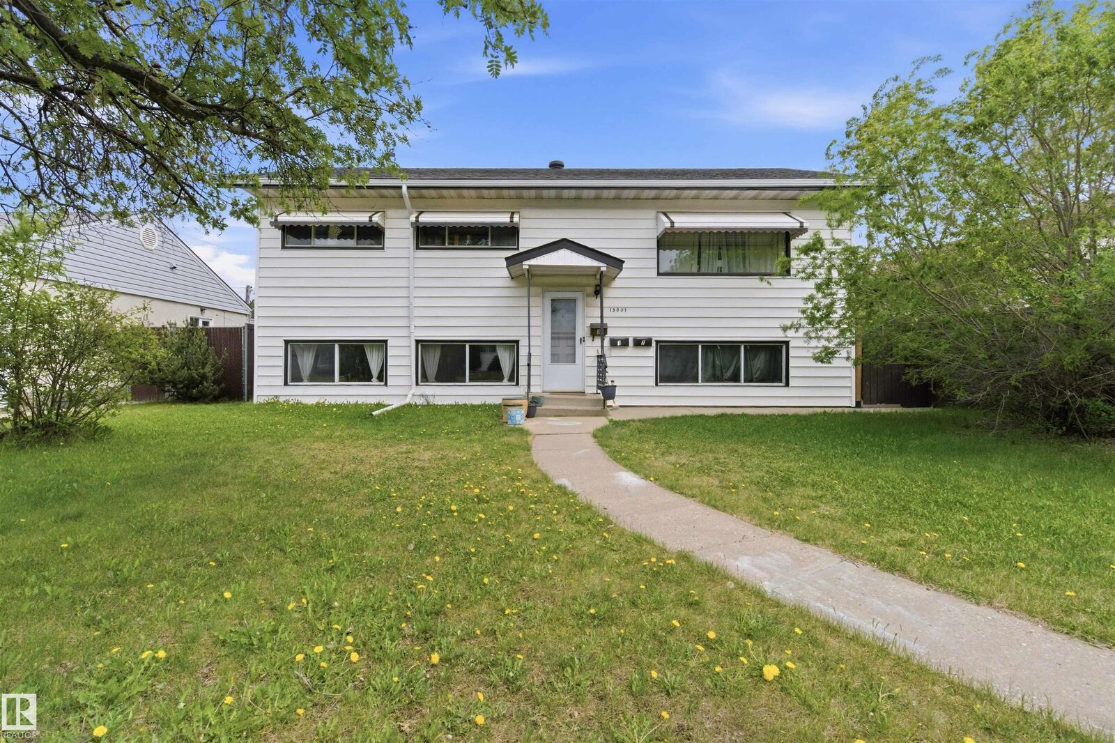 Property Photo:  13007 135 Street NW  AB T5L 1Y6 