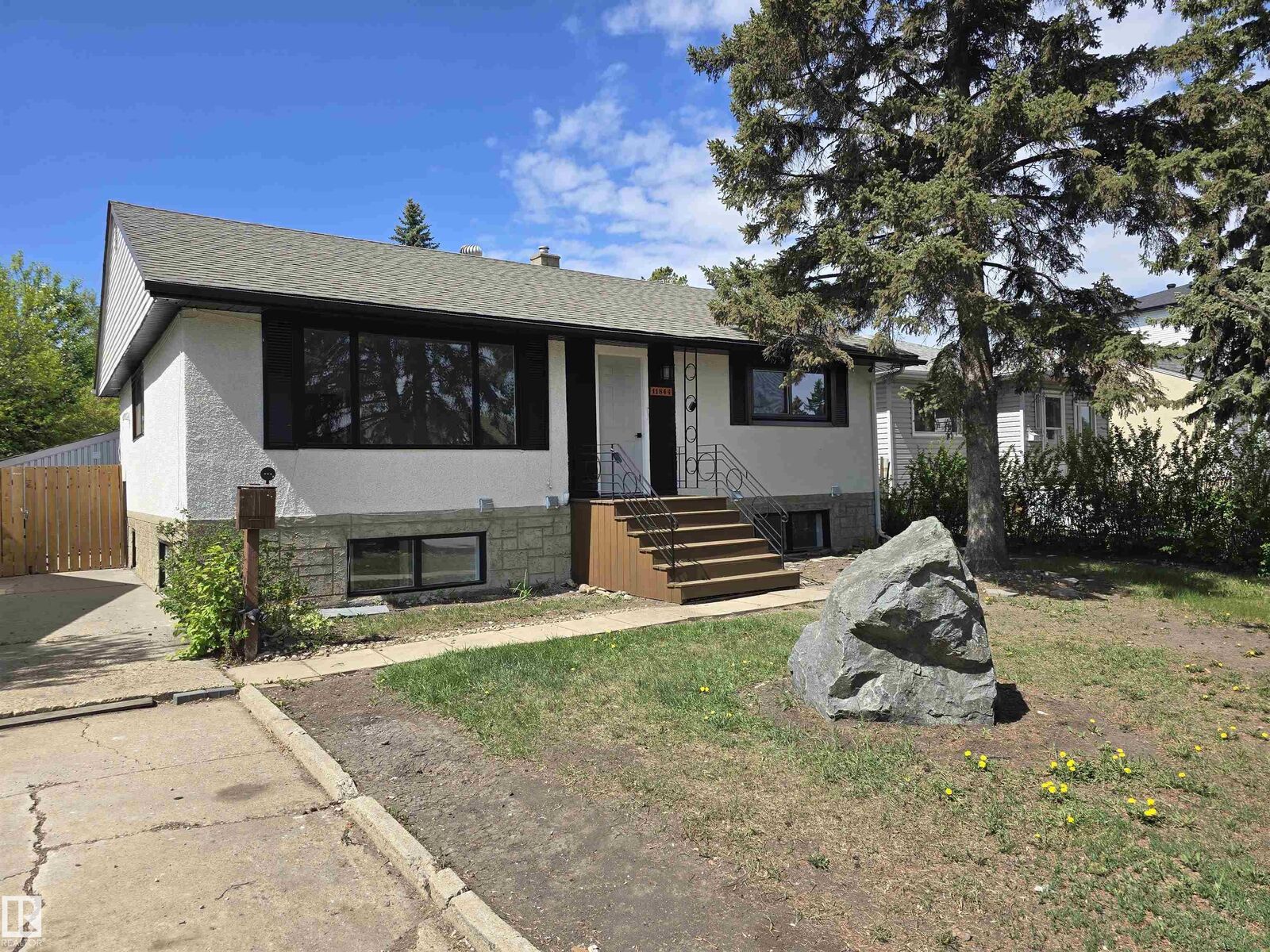 Property Photo:  11844 St Albert Trail NW  AB T5L 4G4 