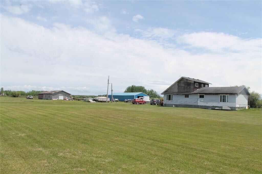 Property Photo:  102202 11 Highway  MB R0E 1V0 