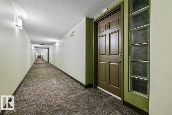 Property Photo: 6315 135 Avenue NW 116 AB T5A 5J7
