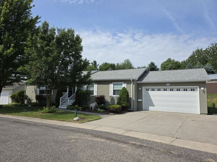 Property Photo:  705 Peach Lane  MI 49412 