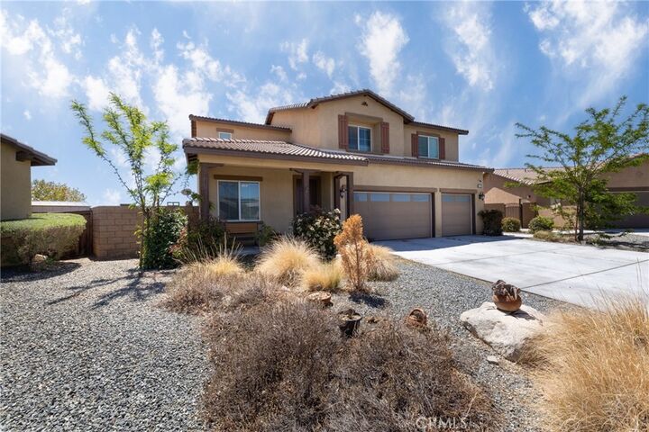 Property Photo:  11239 Scarlet Ave  CA 92301 