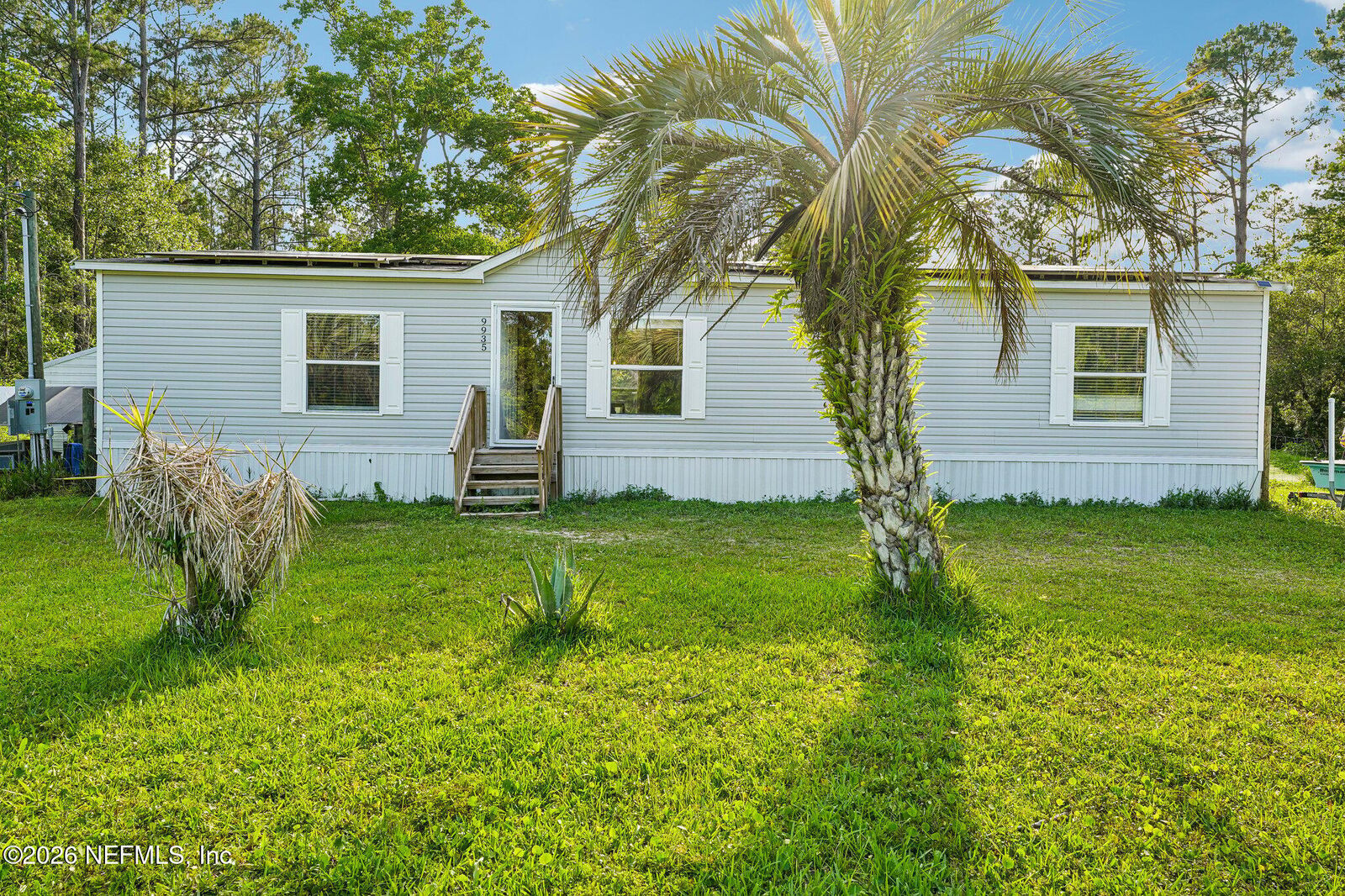 Property Photo:  9935 Amos Avenue  FL 32145 