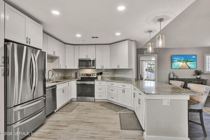 Property Photo:  1701 The Greens Way 2024  FL 32250 