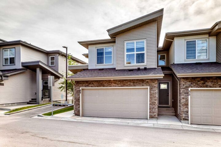 Property Photo:  53 Spring Creek Common SW  AB T3H 6E2 