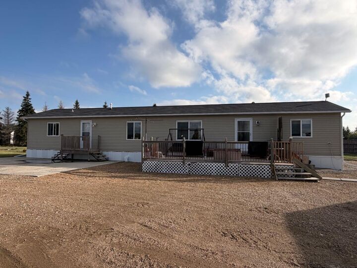 Property Photo:  305600A Range Road 254  AB T0M 1J0 