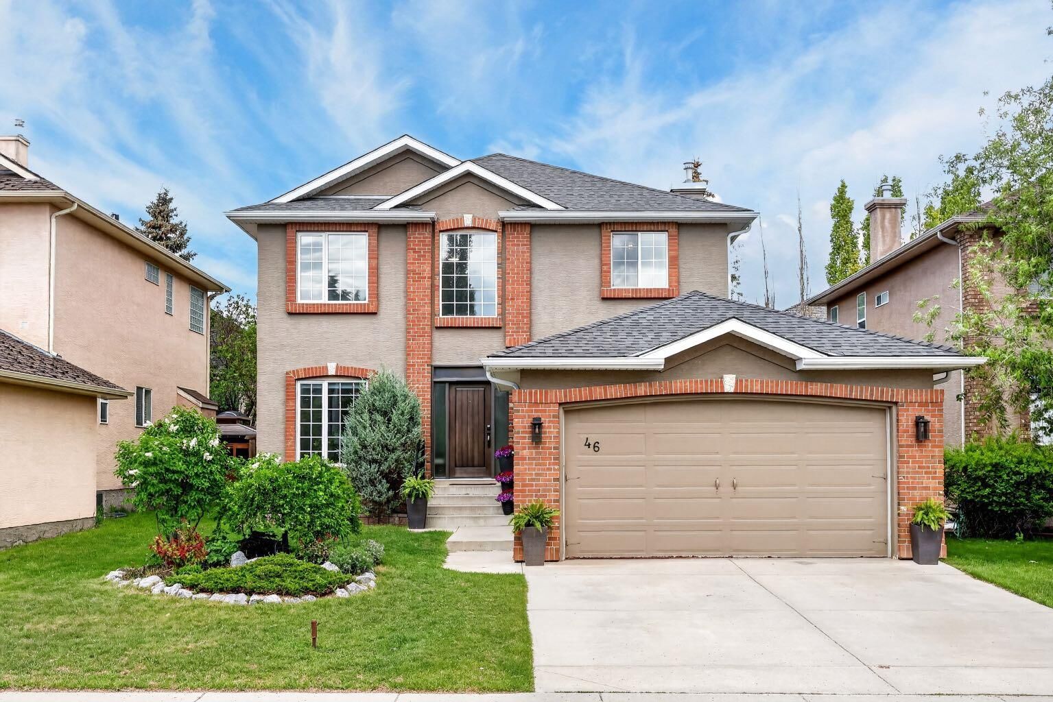 Property Photo: 46 Simcrest Manor SW AB T3H 4K2