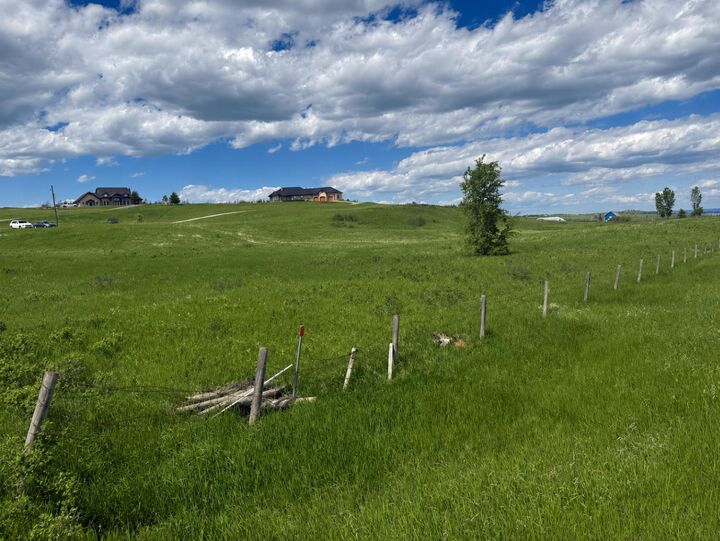 Property Photo: 32022 268 Avenue W AB T1S 5M7