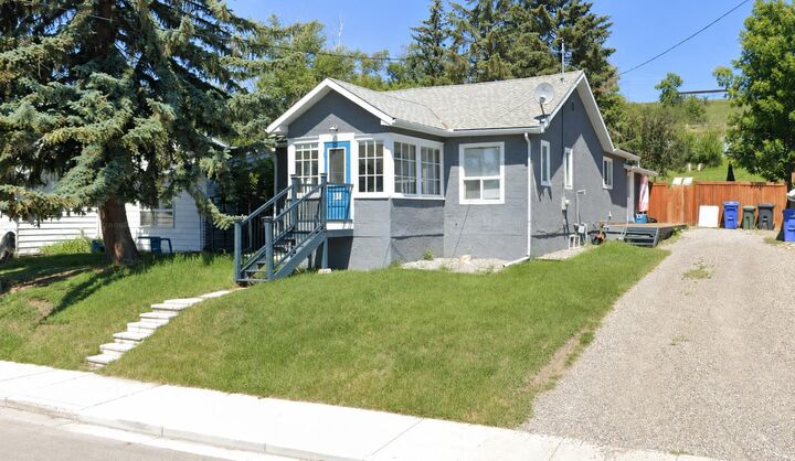 Property Photo: 18 Maple Street AB T1S 1J6