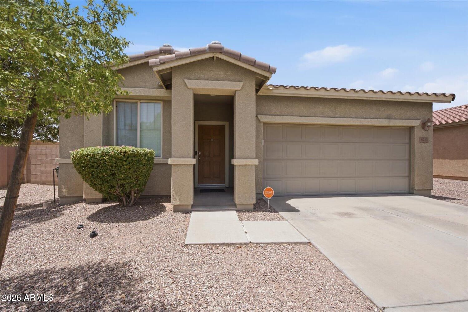Property Photo: 6912 S 74th Lane AZ 85339
