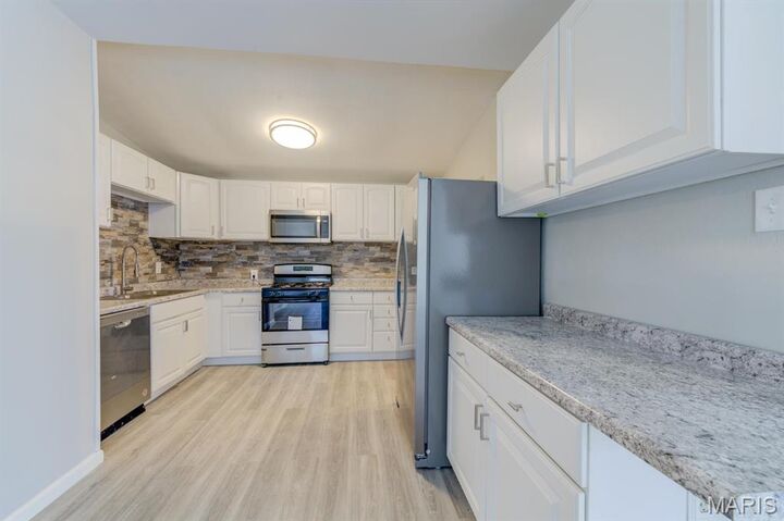 Property Photo: 6628 Bitteroot Lane MO 63134