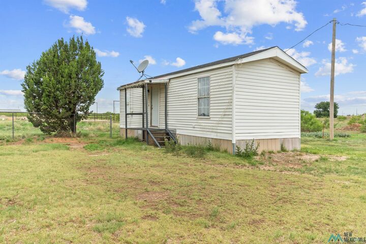 Property Photo:  674 S Roosevelt Road T Street  NM 88130 