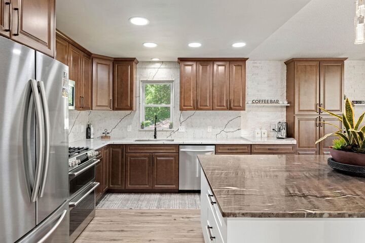 Property Photo:  7712 N College Park Drive  MN 55445 