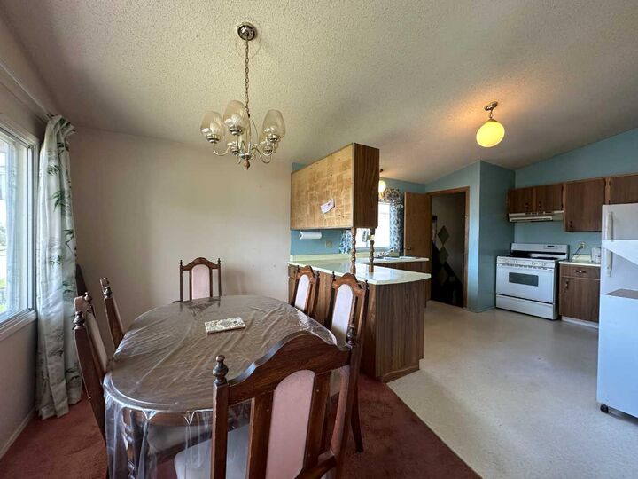 Property Photo:  5406 54 Street  AB T4L 1L9 