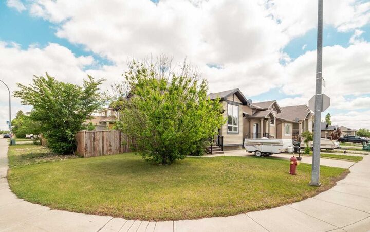 Property Photo:  491 Lettice Perry Road N  AB T1H 5P1 