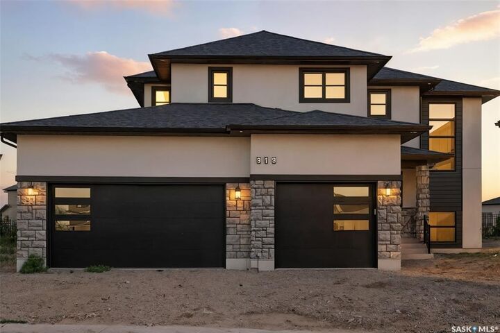Property Photo: 319 Woolf Bay SK S7W 1E5