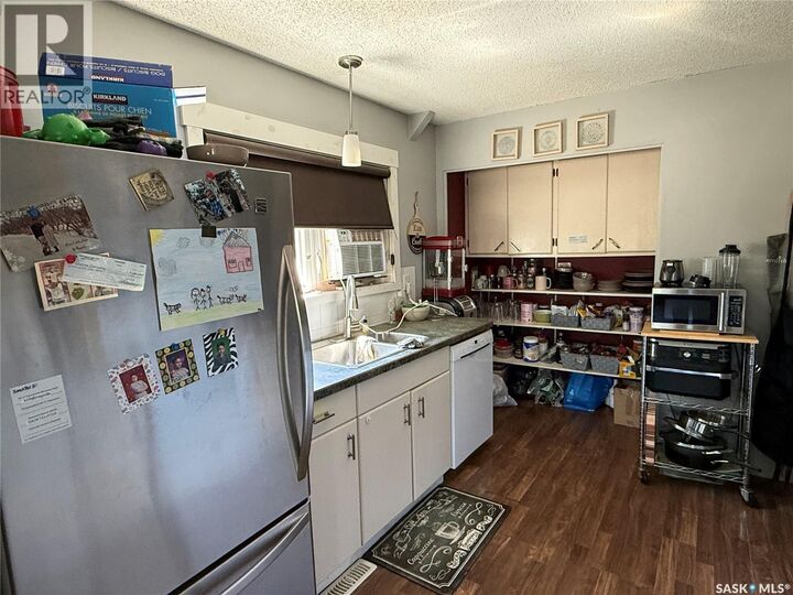 Property Photo:  103 4th Avenue SE  SK S4H 1X7 