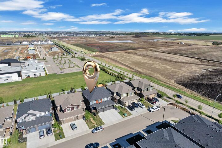 Property Photo: 7647 Koruluk Place SW AB T6W 4R7