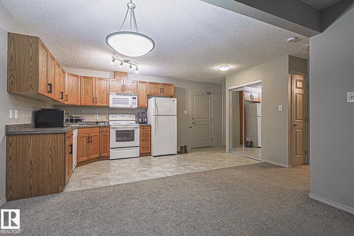 Property Photo: 309 Clareview Station Drive NW 119 AB T5Y 0C5